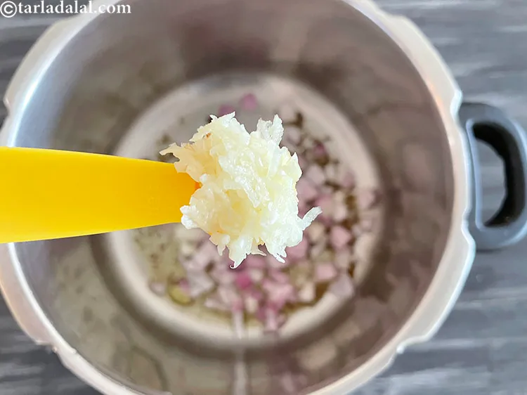 Step 21 – Add&nbsp;<meta charset="UTF-8" />1 tsp&nbsp;<a href="glossary-garlic-paste-lehsun-ki-paste-lahsun-ki-paste-350i">garlic (lehsun) paste</a>.