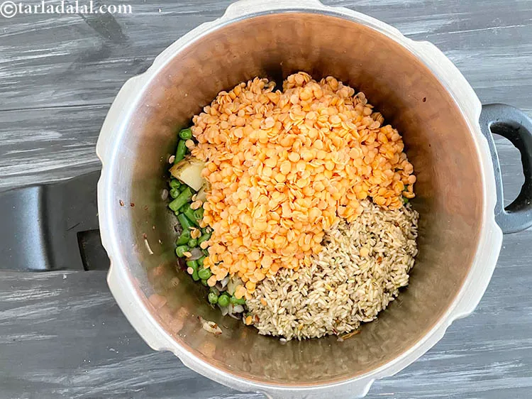 Step 28 – Add&nbsp;<meta charset="UTF-8" />1 cup&nbsp;<a href="glossary-masoor-dal-split-red-lentil-masoor-ki-dal-303i">masoor dal (split red lentil)</a>&nbsp;, washed, soaked and drained.