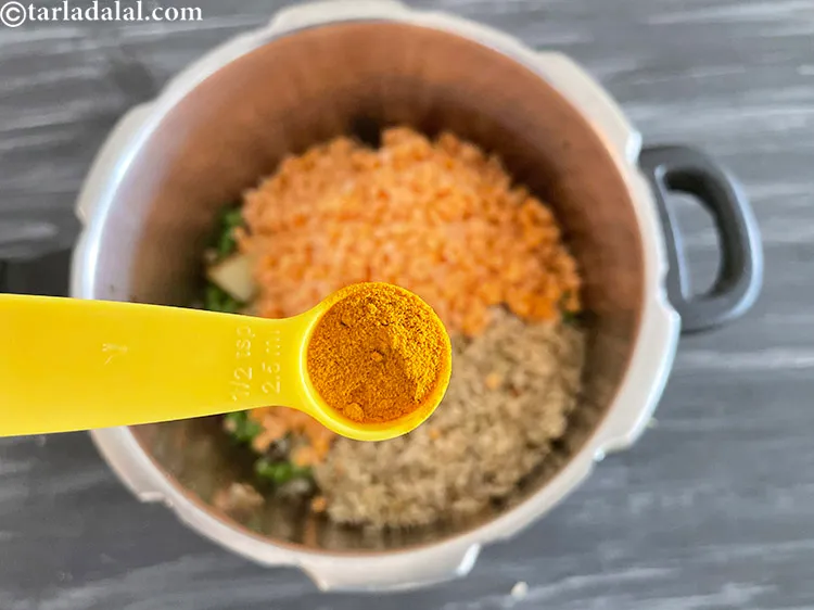 Step 29 – Add&nbsp;<meta charset="UTF-8" />1/2 tsp&nbsp;<a href="glossary-turmeric-powder-haldi-645i">turmeric powder (haldi)</a>.