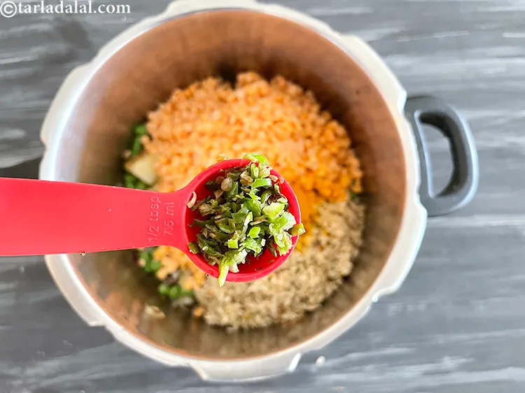 Step 30 – Add&nbsp;<meta charset="UTF-8" />2 1/2 tsp&nbsp;<a href="glossary-green-chilli-paste-hari-mirch-ki-paste-mirchi-paste-333i">green chilli paste</a>.