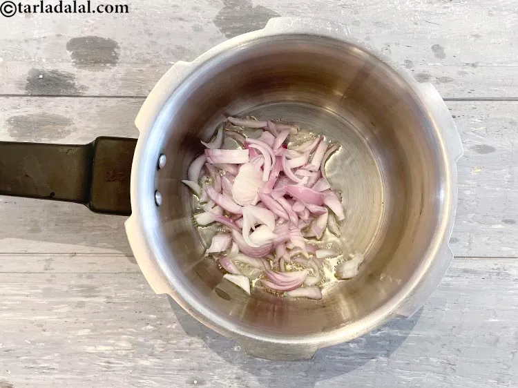 Step 9 – Add&nbsp;<meta charset="UTF-8" />1/2 cup&nbsp;<a href="glossary-sliced-onions-745i">sliced onions</a>.&nbsp;Raw onions are a very valuable source of&nbsp;<a href="https://www.tarladalal.com/recipes-for-Vitamin-C-Rich-Indian-Recipes-804" target="_blank">vitamin …