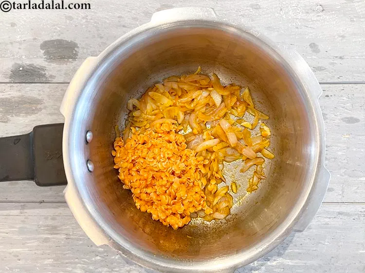 Step 14 – Add&nbsp;<meta charset="UTF-8" />4 tbsp&nbsp;<a href="glossary-masoor-dal-split-red-lentil-masoor-ki-dal-303i">masoor (split red lentil) dal</a>.