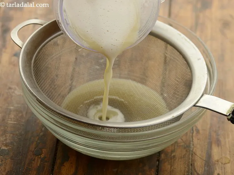 Step 18 – Strain the cooked dal mixture for <strong>lentil soup for babies above 6 months</strong> using a …