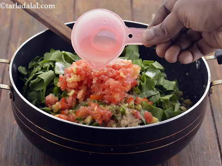 स्टेप 15 – १ कप पानी डालें। अगर आपको पतली दाल चाहिए तो …