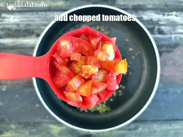Step 19 – Add&nbsp;<meta charset="UTF-8" />1/4 cup&nbsp;<a href="glossary-chopped-tomatoes-779i">chopped tomatoes</a>.