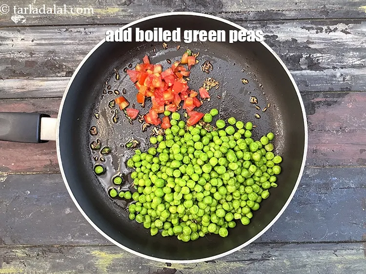 Step 20 – Add&nbsp;<meta charset="UTF-8" />1 1/2 cups&nbsp;<a href="glossary-boiled-green-peas-1078i">boiled green peas</a>.