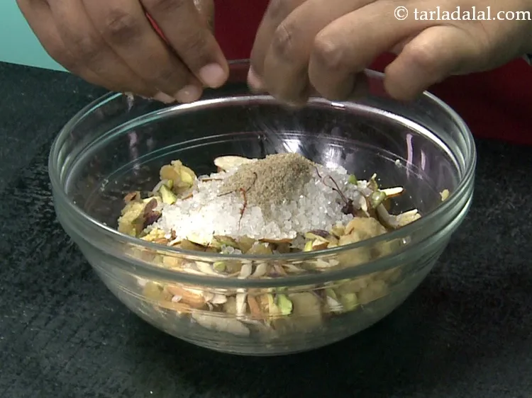 Step 33 – Add a few&nbsp;<a href="https://www.tarladalal.com/glossary-saffron-kesar-520i">saffron (kesar) strands</a>.