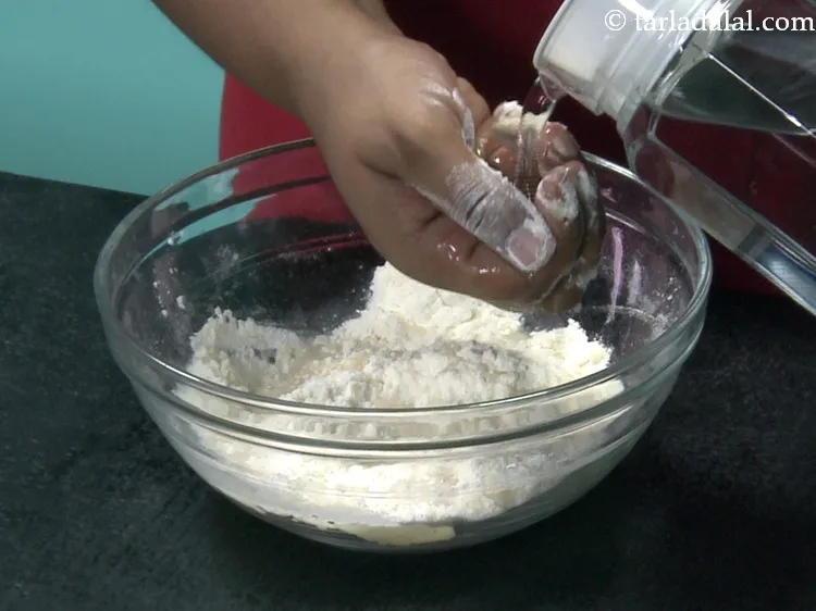 Step 24 – Add water gradually.&nbsp;