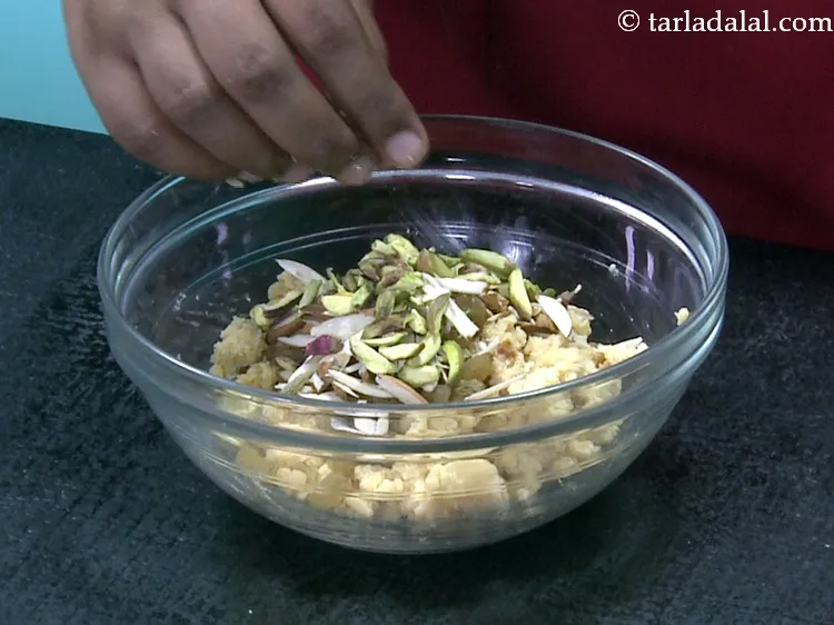 Step 30 – Add 2 tbsp&nbsp;<a href="https://www.tarladalal.com/glossary-pistachio-slivers-894i">pistachio slivers</a>.