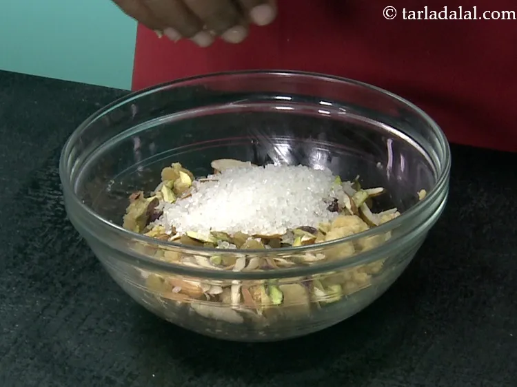 Step 31 – Add 2 tbsp&nbsp;<a href="https://www.tarladalal.com/glossary-sugar-chini-shakkar-278i">sugar</a>.