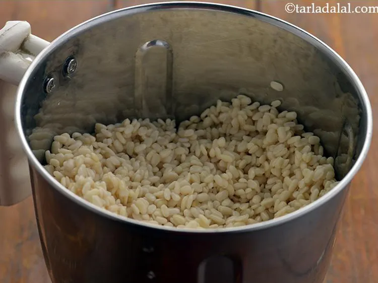 Step 17 – Transfer the soaked urad dal to a mixer jar.