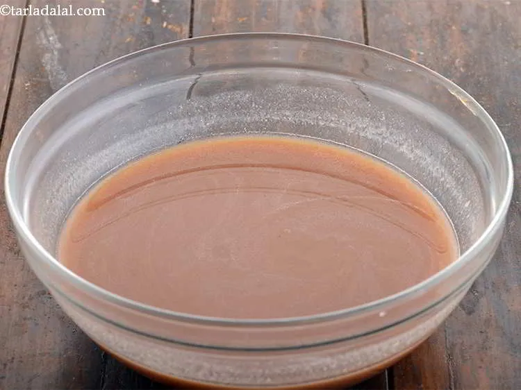 Step 18 – Add 1 tbsp <a href="https://www.tarladalal.com/meetha-chutney-35075r">meetha chutney</a>.