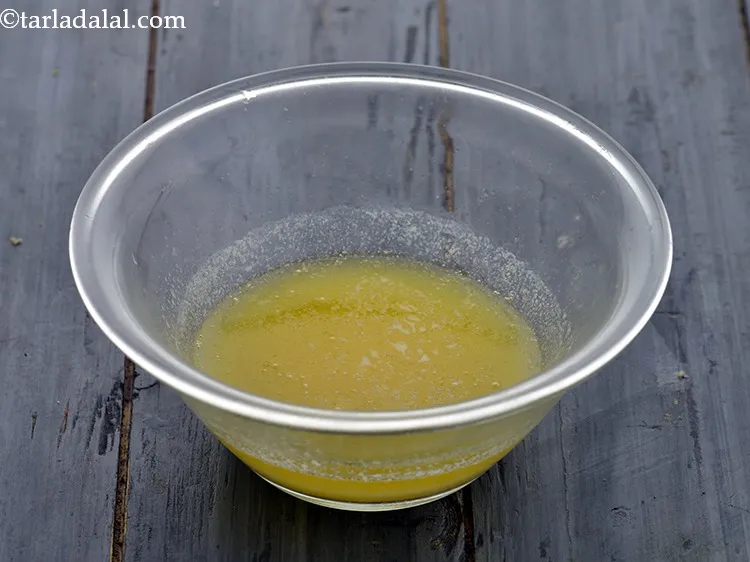 Step 4 – Transfer the crushed biscuit powder in a bowl, add 5 tbsp&nbsp;<a href="https://www.tarladalal.com/glossary-melted-butter-1941i">melted butter</a>. Using melted …