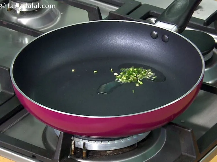 Step 28 – Add the finely chopped green chillies. You can use green chilli paste if you wish …