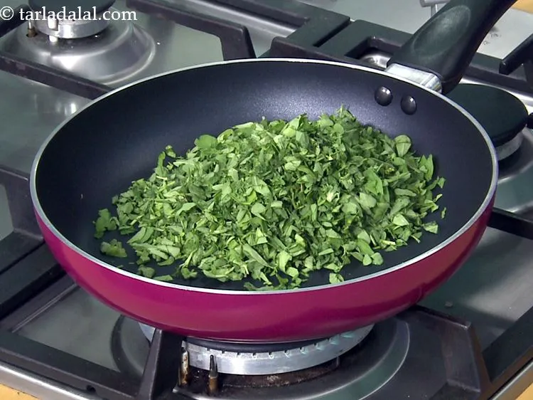 Step 30 – Add the fenugreek leaves.