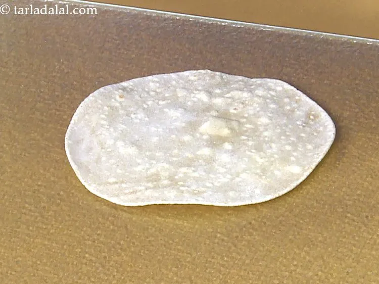 Step 40 – Place the chapati on a clean, dry surface.