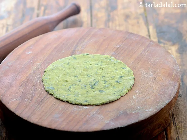 Step 12 – Roll each portion into a 100 mm. (4&rdquo;) diameter circle using a little whole wheat …