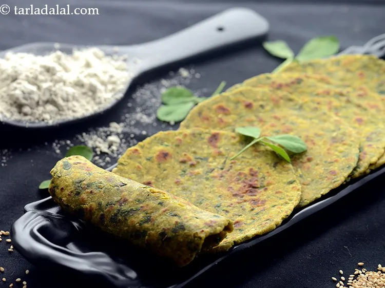 Step 15 – Serve the <strong>methi bajra parathas</strong> hot with <a href="https://www.tarladalal.com/Low-Fat-Curds-3962r">low fat curds </a>to complete a healthy …