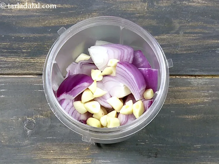 Step 26 – Add 1/2 tbsp&nbsp;roughly&nbsp;<a href="https://www.tarladalal.com/glossary-chopped-garlic-790i">chopped garlic (lehsun)</a>.