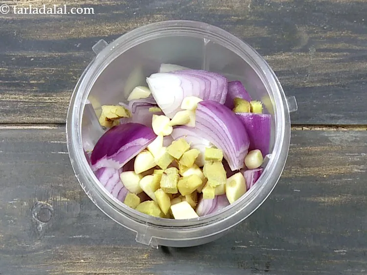 Step 27 – Add 1 tsp&nbsp;roughly&nbsp;<a href="https://www.tarladalal.com/glossary-chopped-ginger-786i">chopped ginger (adrak)</a>.