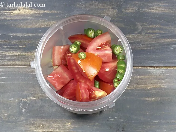 Step 30 – Add 1 tsp&nbsp;roughly&nbsp;<a href="https://www.tarladalal.com/glossary-chopped-green-chilli-820i">chopped green chillies</a>.