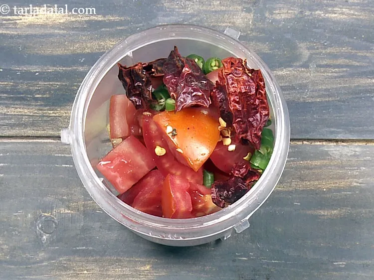 Step 31 – Add 1&nbsp;<a href="https://www.tarladalal.com/glossary-whole-dry-kashmiri-red-chillies-kashmiri-mirch-kashmiri-lal-mirch-332i">whole dry kashmiri red chilli</a>&nbsp;, broken into pieces.&nbsp;