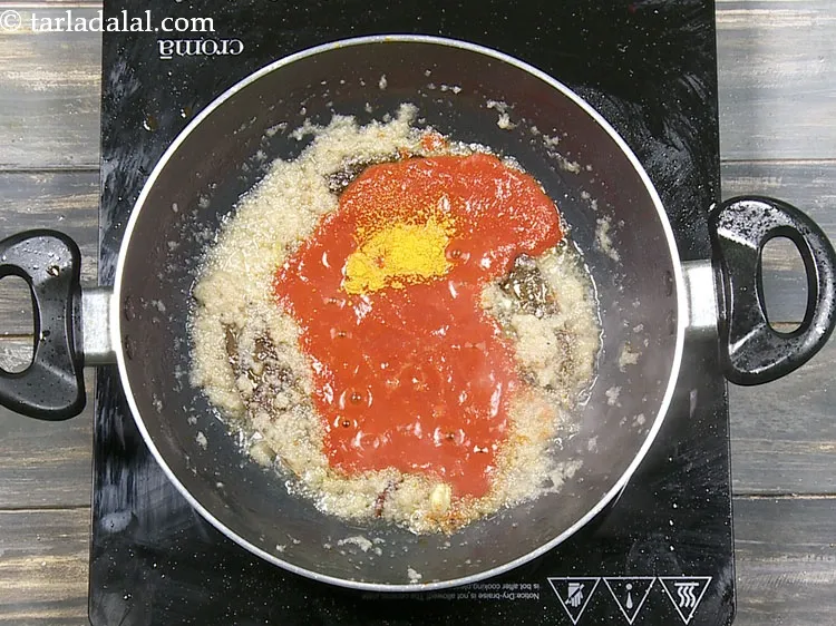Step 42 – Add 1/4 tsp&nbsp;<a href="https://www.tarladalal.com/glossary-turmeric-powder-haldi-645i">turmeric powder (haldi)</a>.