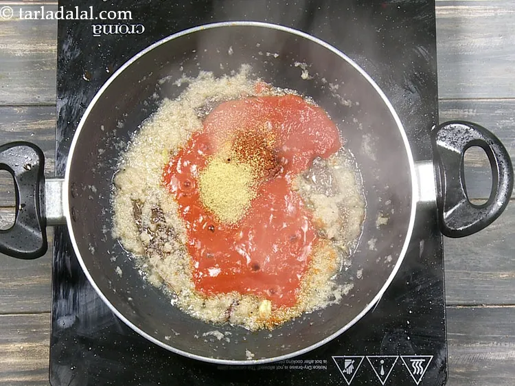 Step 44 – Add 1 tsp&nbsp;<a href="https://www.tarladalal.com/glossary-coriander-powder-dhania-powder-370i">coriander (dhania) powder</a>.
