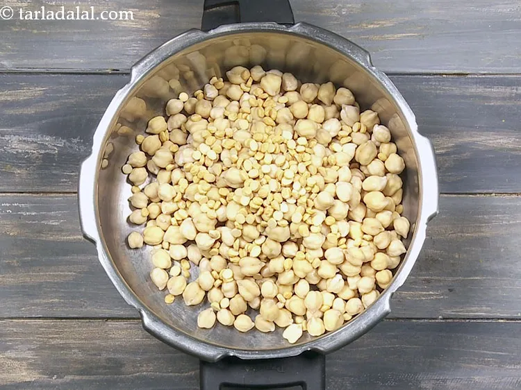 Step 18 – Add 2 tbsp&nbsp;<a href="https://www.tarladalal.com/glossary-chana-dal-split-bengal-gram-285i">chana dal (split bengal gram)</a>.