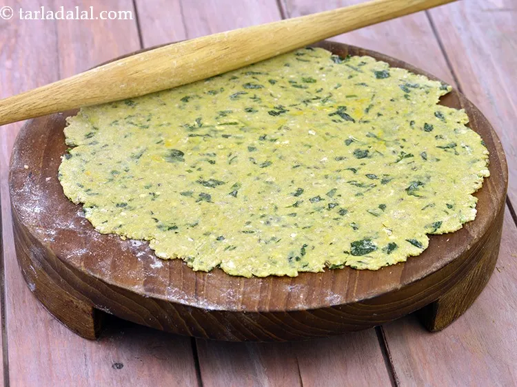 Step 34 – Roll each portion of the dough into a 200 mm. (8&rdquo;) diameter thin circle using …