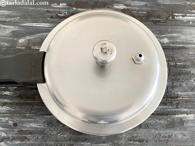 Step 29 – Pressure cook for 1 whistle.