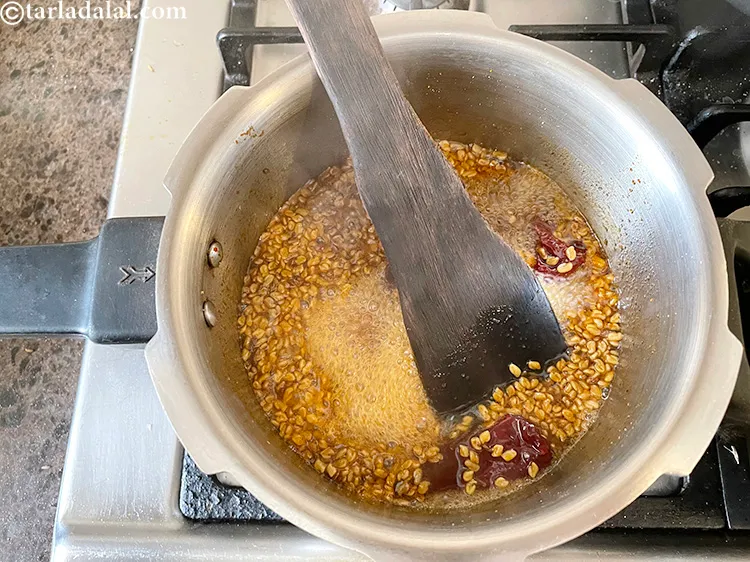 Step 31 – Switch on the flame and cook on a medium flame for 5 to 7 minutes, …