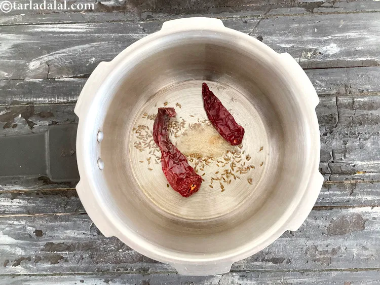 Step 15 – Add&nbsp;<meta charset="UTF-8" />2&nbsp;<a href="glossary-whole-dry-kashmiri-red-chillies-kashmiri-mirch-kashmiri-lal-mirch-332i">whole dry kashmiri red chillies</a>.