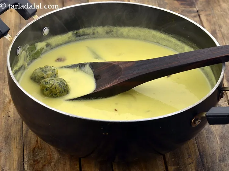 Step 35 – Mix gently and cook on a medium flame for 2 minutes.