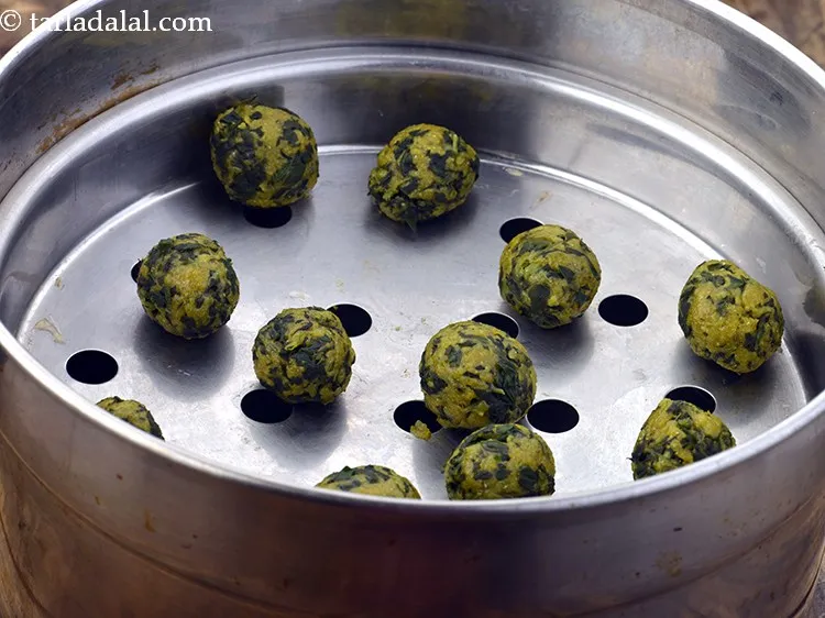 Step 34 – Add the methi koftas.