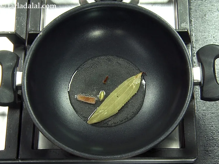 Step 44 – Add 1&nbsp;<a href="https://www.tarladalal.com/glossary-bayleaf-tejpatta-tej-patta-189i">bayleaf (tejpatta)</a>.