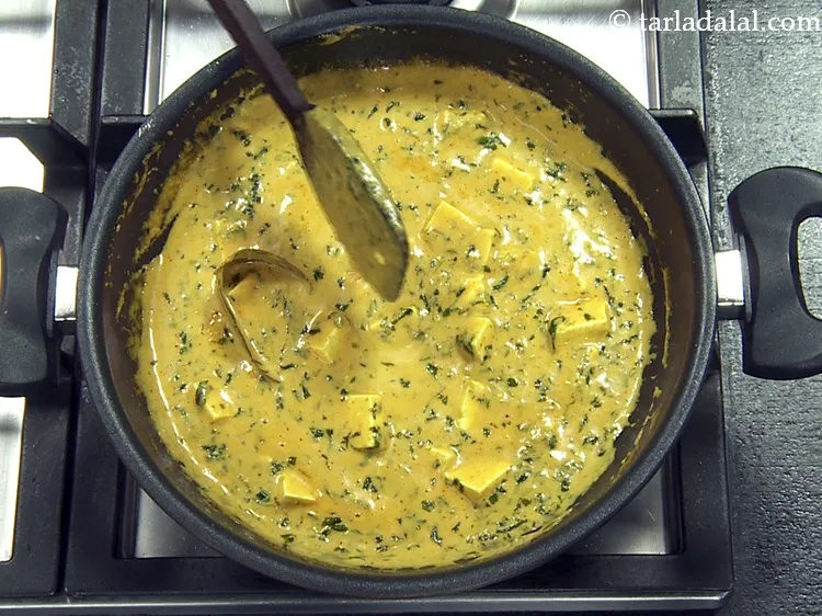 Step 61 – Mix gently and cook on a medium flame for 1 minute.