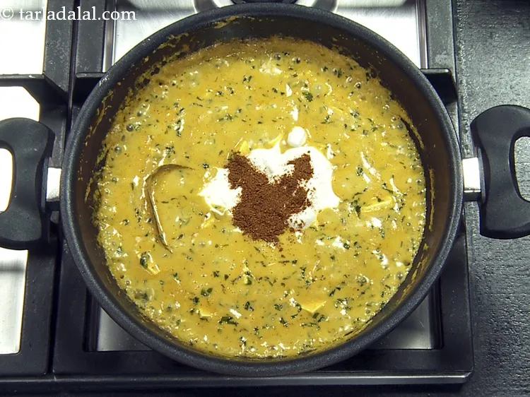 Step 63 – Add garam masala. If you wish, you can <a href="http://?https://www.tarladalal.com/garam-masala-163r" target="_blank"><strong>make garam masala at home.</strong></a>