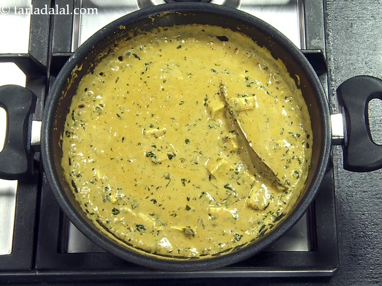 Step 64 – Mix gently and cook on a medium flame for 1 minute, while stirring occasionally.