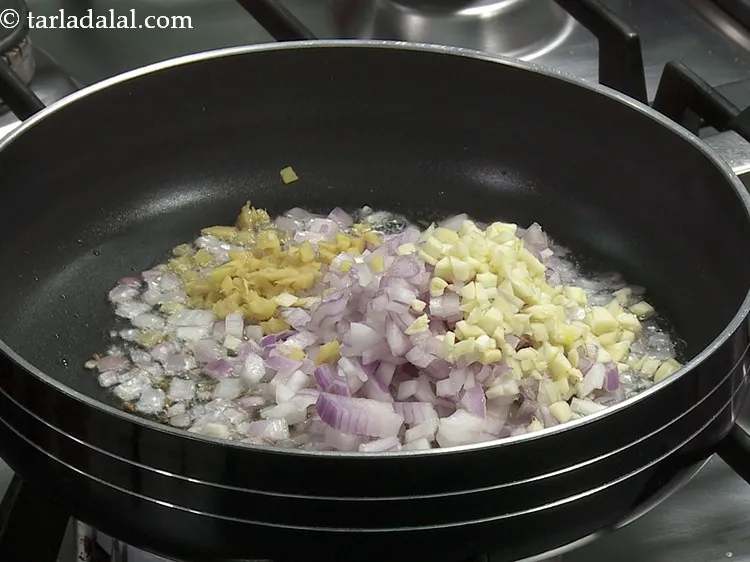 Step 31 – Add 1 1/2 tbsp&nbsp;<a href="https://www.tarladalal.com/glossary-chopped-garlic-790i">chopped garlic (lehsun)</a>.