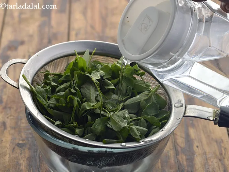 Step 11 – Wash the fenugreek leaves so that the dirt goes away.