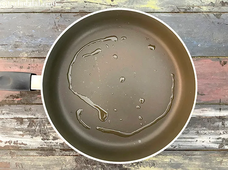 Step 12 – Heat 1 tsp oil in a non-stick pan.