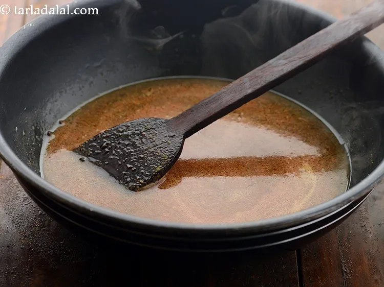 Step 13 – Mix well and cook on a low flame till the water starts boiling.