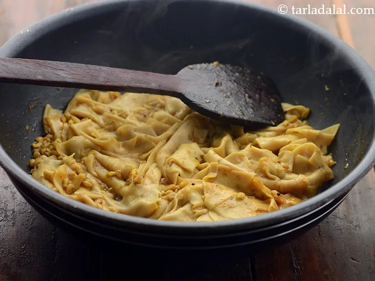 Step 16 – Mix well and simmer for 4 to 5 minutes, while stirring occasionally. Our <strong>Rajasthani Dana …