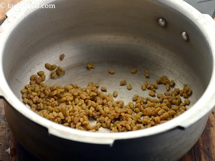 Step 3 – Transfer the fenugreek seeds to a pressure cooker.