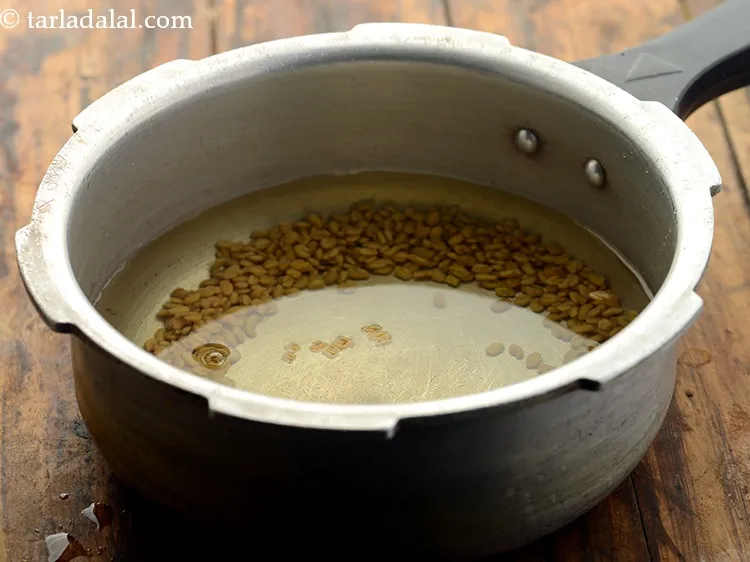 Step 4 – Add enough water and pressure cook for 3 whistles.