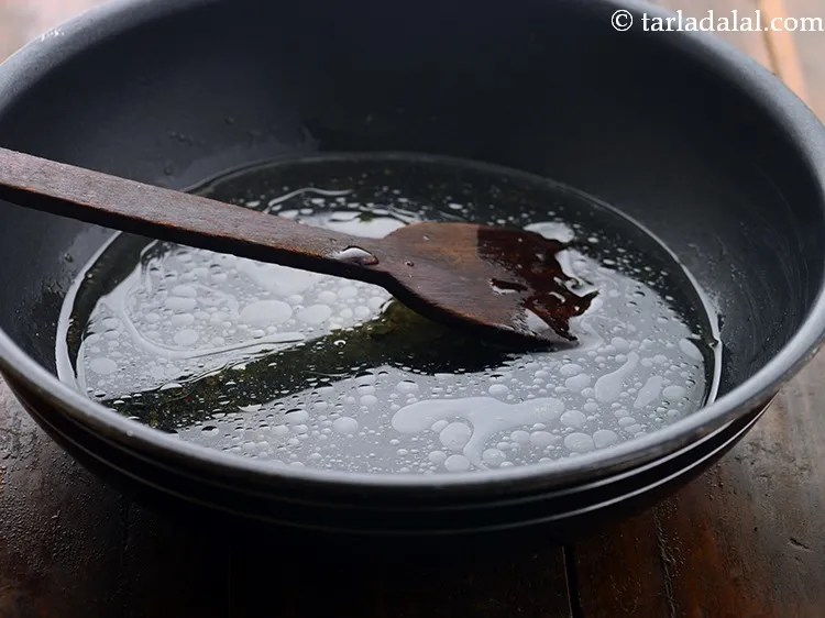 Step 7 – When the seeds crackle, add 1&frac12; cups of water. To avoid the bitterness, you can …