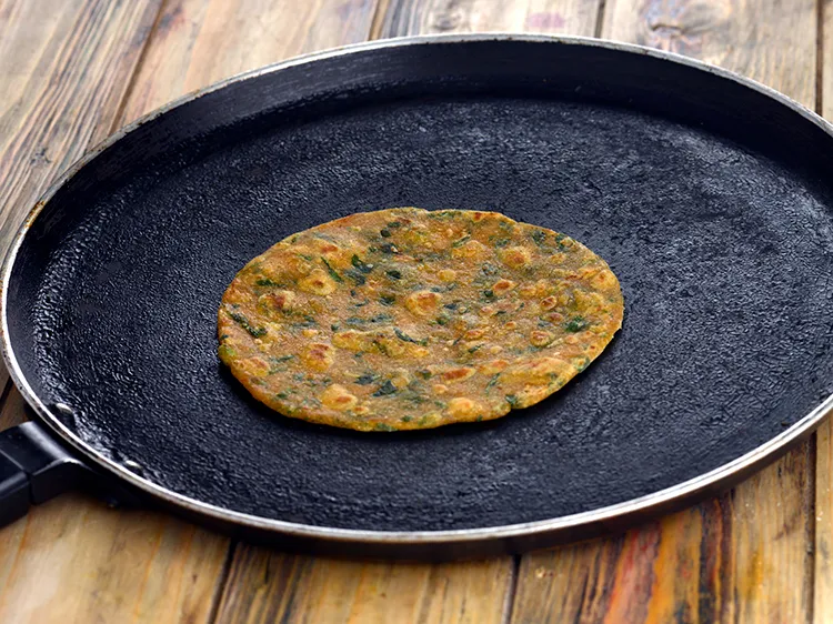 Step 16 – Again turnover, apply oil on the other side and cook till it turns golden brown …