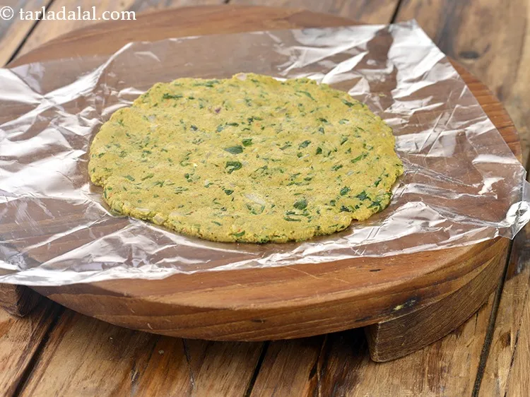 Step 37 – Keep flattening it evenly into a 150 mm. (6&rdquo;) circle by patting with your fingers.