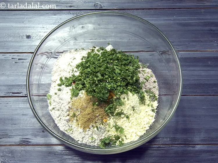 Step 27 – Add 1/4 cup&nbsp;finely&nbsp;<a href="https://www.tarladalal.com/glossary-chopped-coriander-783i">chopped coriander (dhania)</a>.